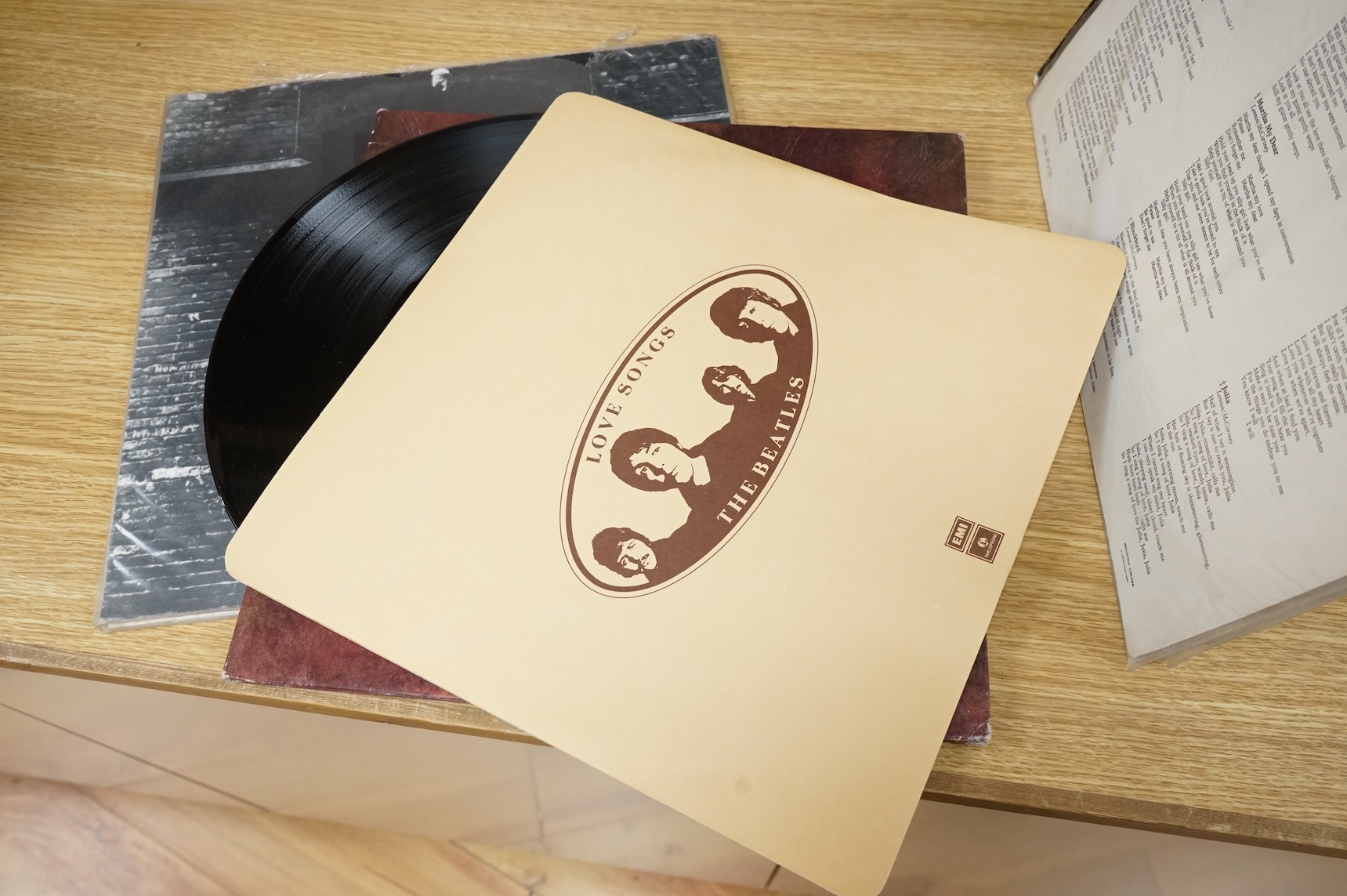 Seven The Beatles LP record albums including; Rubber Soul, two copies of Revolver, The Beatles Vol.1 - Chilean pressing, Love Songs, John Lennon; Rock ‘n’ Roll, Paul McCartney RAM - Chilean pressing.